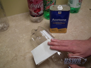 Testing to see if acetone will remove the bottle label.