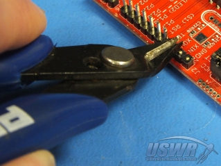 If your LaunchPad board has the pins inderted, you must remove or trim off the unused pins.